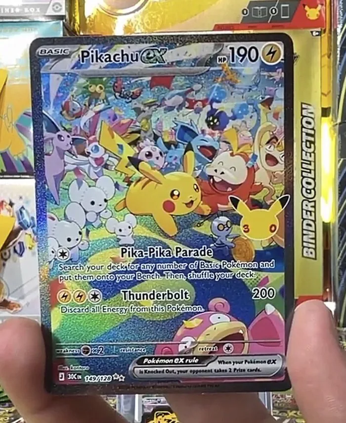Carte Pikachu ex 149/128 du set 30K, 190 PV type Électrique, attaques Pika-Pika Parade et Thunderbolt 200, illustration kantaro avec des dizaines de Pokémon, extension 30e Anniversaire Pokémon